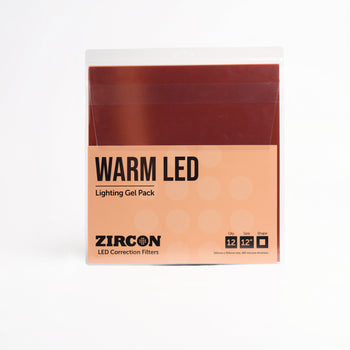 LEE Filters Zircon Warm LED Lighting Gel Pack in a clear plastic sleeve with a white and peach label, showing a dark reddish-brown gel filter inside.